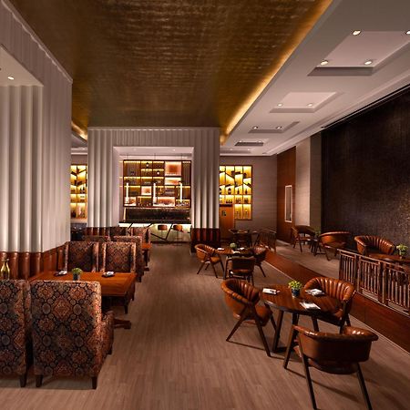 Hotel Jaypee Vasant Continental Neu-Delhi Exterior foto The interior of the restaurant