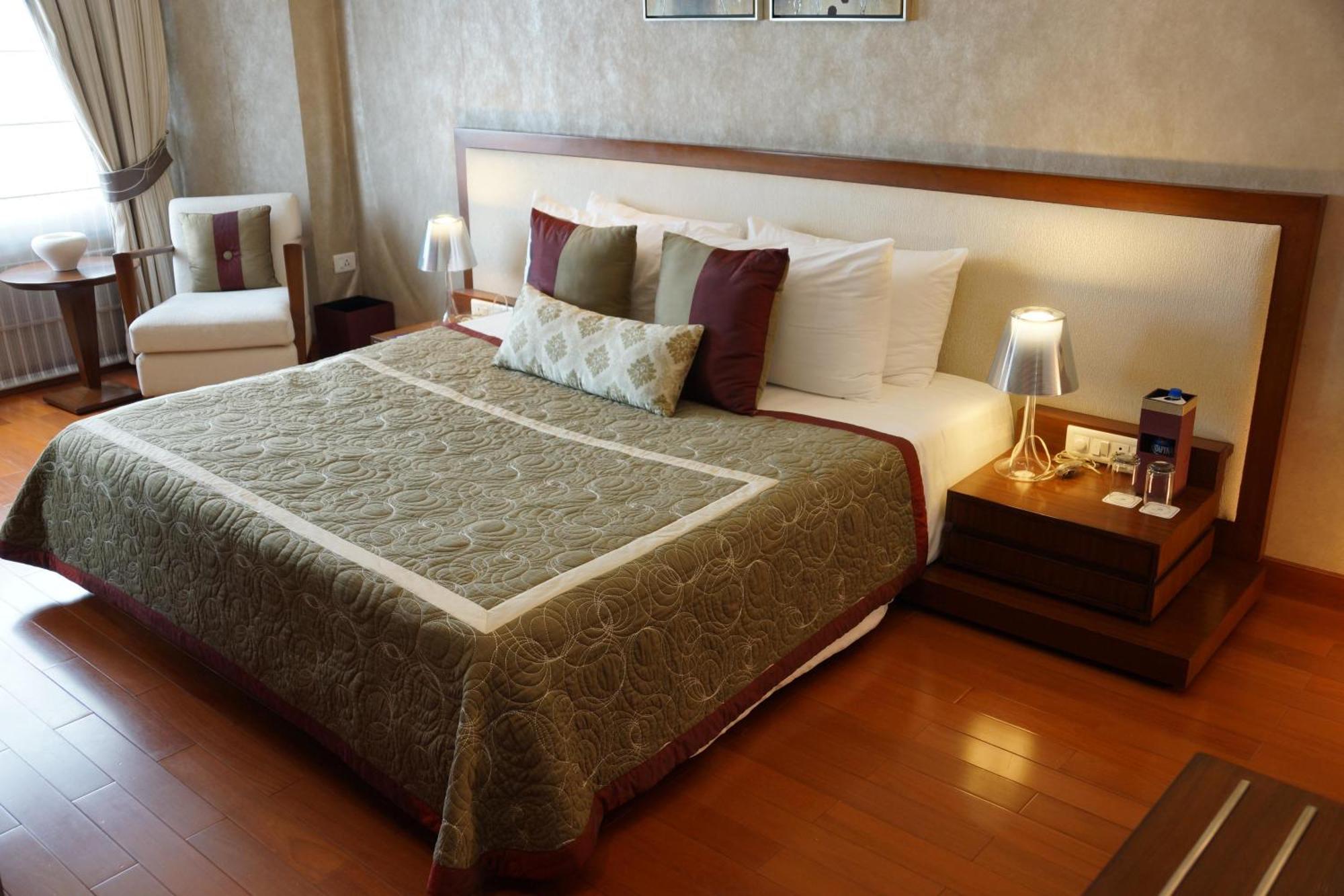Hotel Jaypee Vasant Continental Neu-Delhi Exterior foto A bedroom